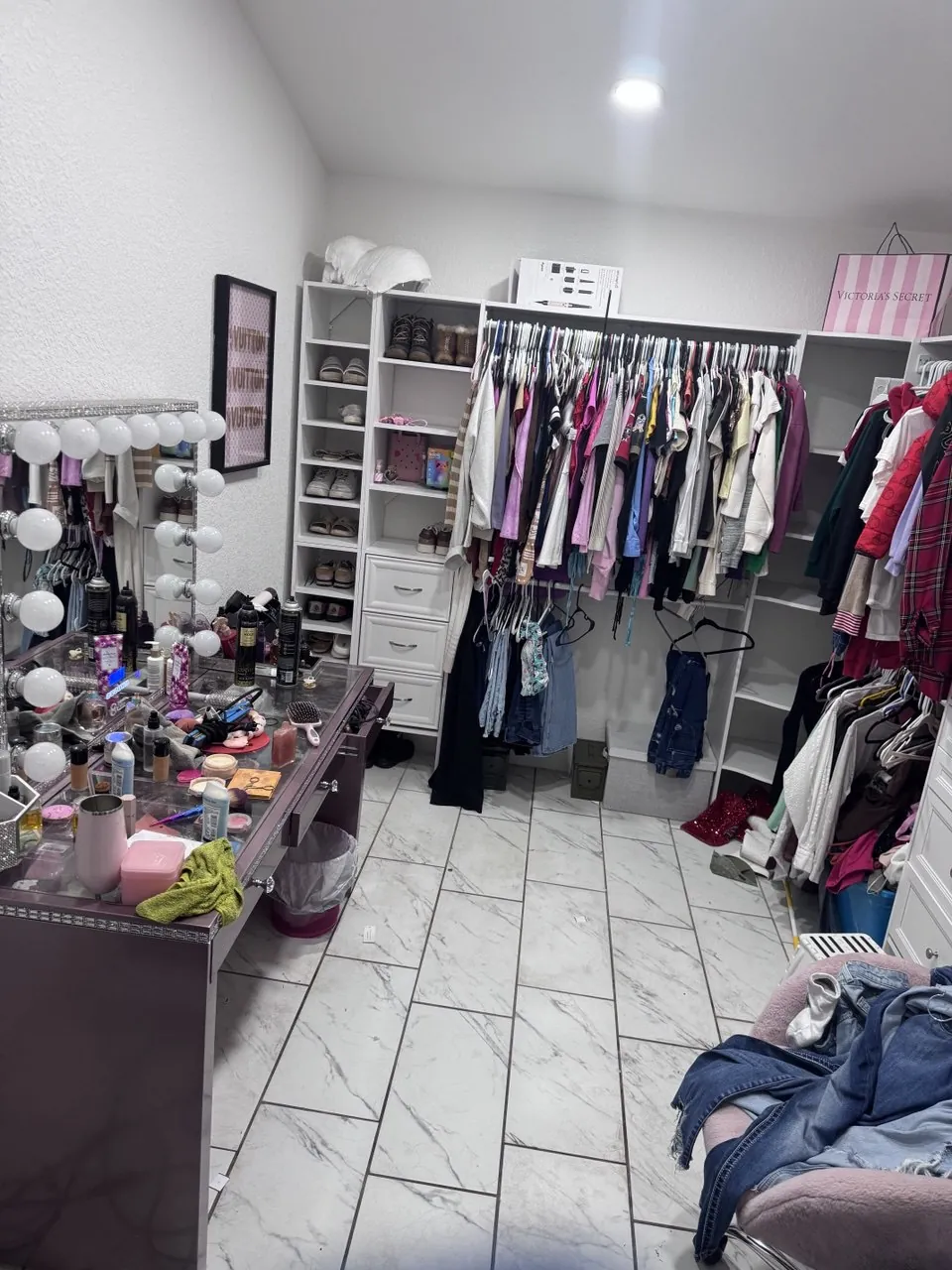 Walk-in closet and vanity before cleaning